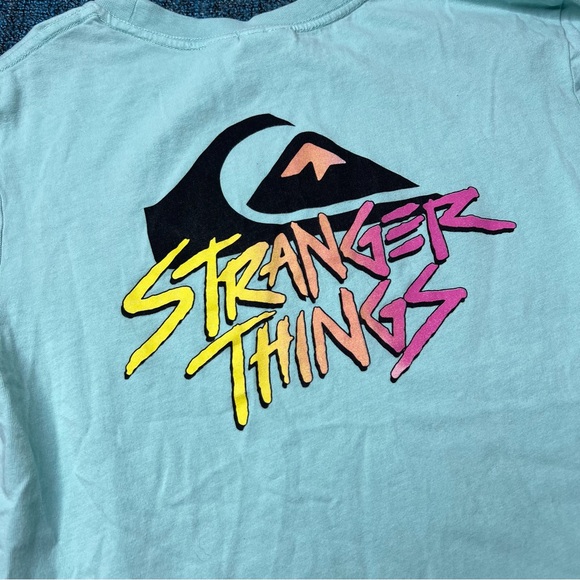 Quicksilver x Strangers Things Short Sleeve Graphic T-Shirt in Teal Blue Neon - Picture 2 of 6